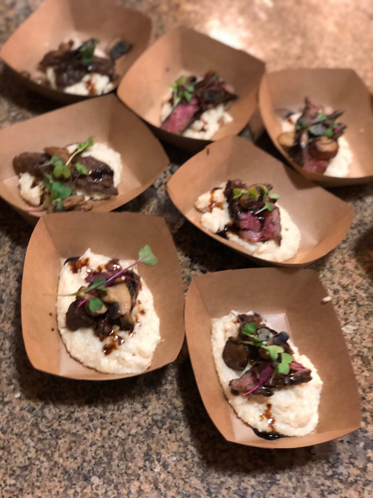 Infused small plates by Chef Matt Stockard. Steak over Polenta with Balsamic reduction and garnish 